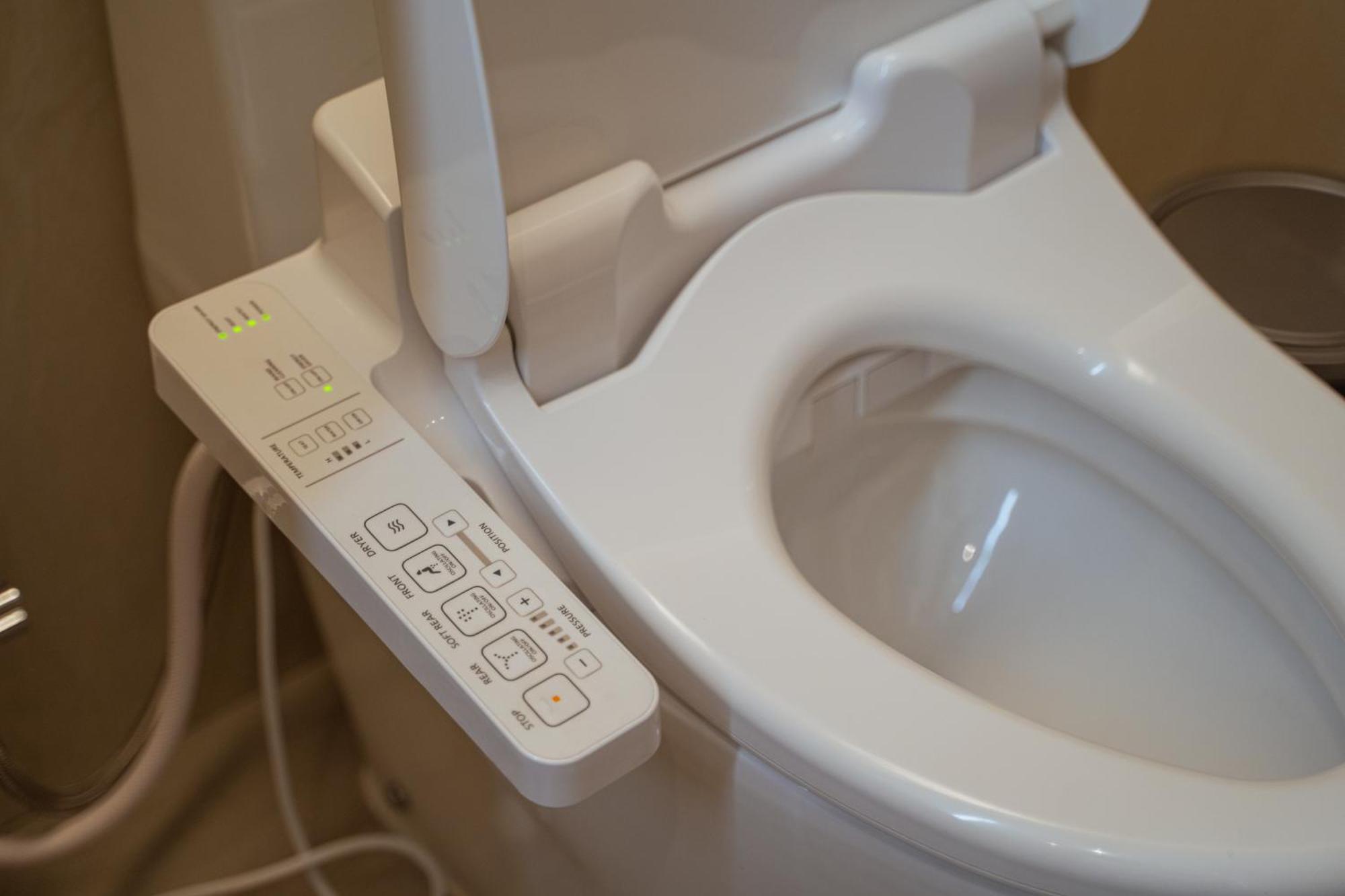 Centre Point Hotel Terminal21 Korat Nakhonratchasima Esterno foto A modern Japanese toilet with bidet and heated seat